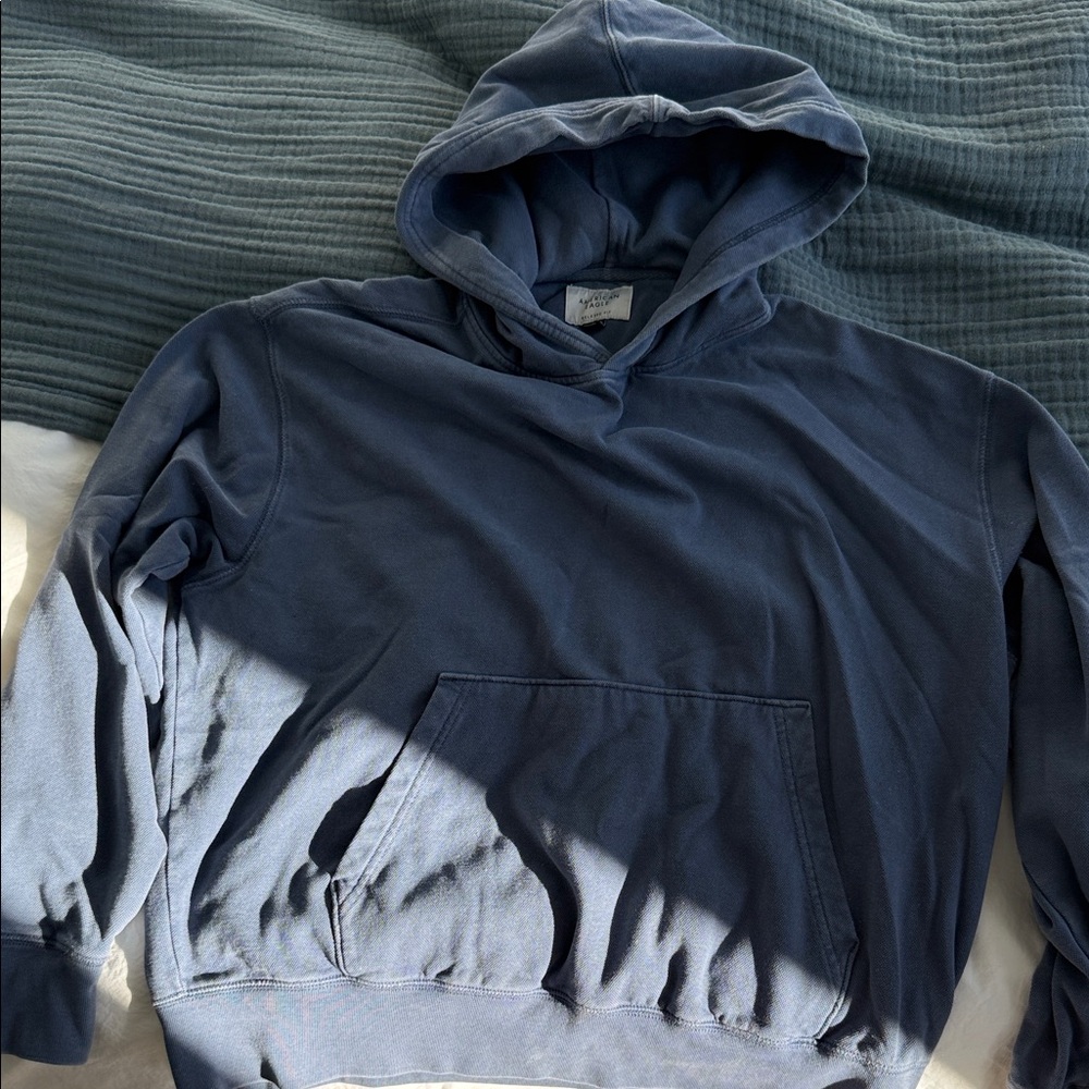 Men's Textured American Eagle (med) relaxed fit jean blue hoodie.